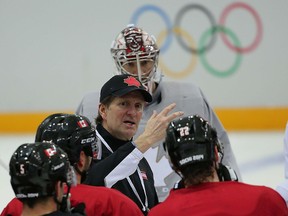 Canadian coach Mike Babcock directs his team during practice on Thursday. (Al Charest, QMI Agency)
