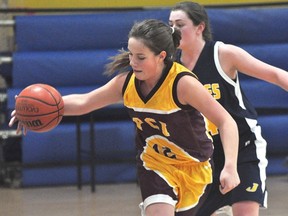 Sam Turner of the PCI Saints varsity basketball team drives to the basket during the Saints' 48-36 win over St. James Feb. 20. (Kevin Hirschfield/THE GRAPHIC/QMI AGENCY)