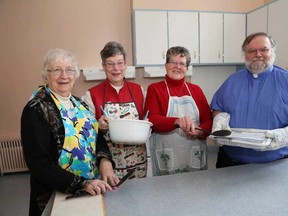 JOHN LAPPA/THE SUDBURY STAR
Barbara McPhail, left, Heather Mitchell, Janet Foy and Rev. Stewart Walker are busy preparing for a lasagna dinner at St. Stephen's on the Hill United Church to be held on Saturday. The dinner will be held at the church at 1248 Lauzon St. from 5 to 7 p.m.