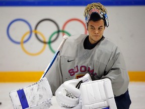 Finland's goalie Tuukka Rask looks on during a men's ice hockey team practice at the 2014 Sochi Winter Olympics, February 20, 2014. (REUTERS)