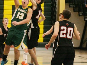 Stony Plain Memorial Comp’s Kobe Gratzfeld goes up to lay in two points during second half action against the SPA Spartans in Metro League action. Stony went on to post the win and snap the Spartans unbeaten record. - Gord Montgomery, Reporter/Examiner