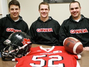 From left to right: Mark Korte, Ed Ilnicki and Justin Lawrence, all graduates of the local high school football program. - Gord Montgomery, Reporter/Examiner