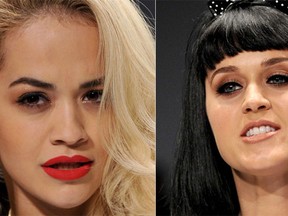 Katy Perry and Rita Ora became high-fashion models for a day, when the singers hit the runway during Milan Fashion Week on Thursday.(AFP PHOTO / TIZIANA FABI)