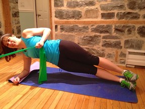 The Side Plank and Overhead Row is a challenging core exercise. (Supplied photo)