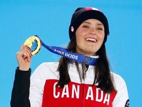 Canadian gold medallist Marielle Thompson celebrates during the victory ceremony for the women’s freestyle skiing skicross event at the 2014 Sochi Winter Olympics on February 21.
SHAMIL ZHUMATOV/REUTERS