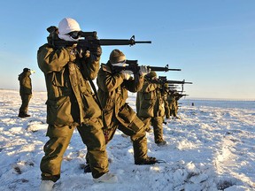 A platoon from Domestic Response Company comprised of soldiers from units across Southern Ontario, fire the C7 rifle during Exercise Trillium Response in Rankin Inlet, Nunavut on Tuesday February 18, 2014. (Photo by: MCpl Dan Pop, Canadian Army Public Affairs)