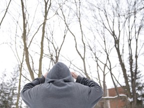 A survivor of multiple sexual assaults, seen here in the backyard of his home east of London, says he hopes he can help other victims. (CRAIG GLOVER, The London Free Press)