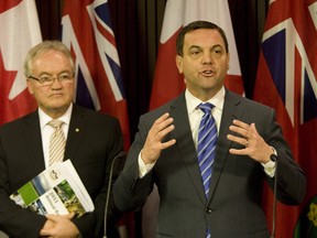 PC MPP John O'Toole, left, and party leader Tim Hudak. (Toronto Sun file photo)
