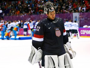 Team USA goalie Jonathan Quick leaves the ice after being defeated by Finland in their men's hockey bronze-medal game at the Sochi 2014 Winter Olympic Games, Feb. 22, 2014. (LASZLO BALOGH/Reuters)