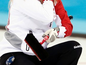 Canada's skip Jennifer Jones reacts after winning the gold medal in women's curling against Sweden at the Sochi 2014 Winter Olympics Feb. 20, 2014. (MARKO DJURICA/Reuters)