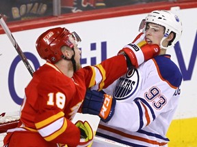 Calgary Flames, Matt Stajan battles Edmonton Oilers, Ryan Nugent-Hopkins in first period NHL action at the Scotiabank Saddledome on Wednesday Apr 3, 2013. Darren Makowichuk/Calgary Sun/QMI AGENCY