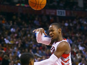 Raptors’ Terrence Ross makes a pass over Brampton’s own Tristan Thompson of the Cavaliers on Friday. Ross has become the Raptors’ go-to defender in only his second year in the NBA. (Dave Abel/Toronto Sun)