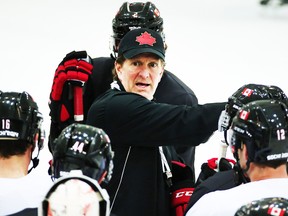 Team Canada head coach Mike Babcock during hockey practice at the 2014 Olympic Winter Games in Sochi, Russia, on Saturday February 22, 2014. (Al Charest/QMI Agency)