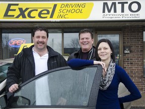 Excel Driving School co-owners Doug Dee (left) and Gerry Dion, with administrator Tabetha Miller, outside their main office at 1724 Bath Rd. The driving school is locally owned and operated since 1969.
JULIA MCKAY/KINGSTON WHIG-STANDARD/QMI AGENCY