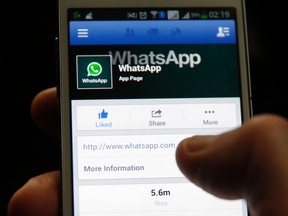 A Whatsapp App page is seen on Facebook on a Samsung Galaxy S4 phone in the central Bosnian town of Zenica, February 20, 2014. (REUTERS/Dado Ruvic)