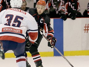 Picton Pirates captain Evan Greer attempts to beat a Campbellford Rebels defender during Jr. C playoff action last weekend in Picton. (EMILY MOUNTNEY/The Intelligencer)