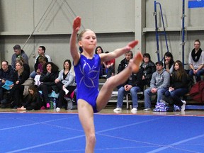 Abby Davidson of the Southport Sapphires performs her floor exercise at the Regional Stream Invitational on Feb. 22 at Southport Recreation Centre. (Johnna Ruocco/PORTAGE DAILY GRAPHIC/QMI AGENCY)