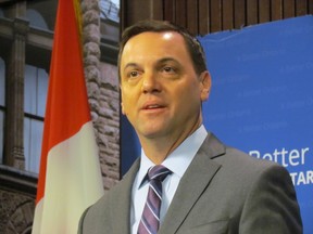 Progressive Conservative Leader Tim Hudak speaks to media at Queen's Park Monday. (ANTONELLA ARTUSO/Toronto Sun)