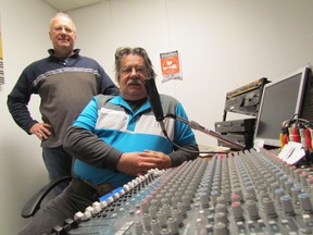 Steve Dumont, of Playfair Music, left, with announcer Chuck Howard at the controls of an on-line radio station that has begun operating at the Sarnia music business. THE OBSERVER/QMI AGENCY