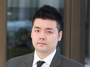 Ottawa police Const. Samson Vo, 29, had a charge of obstructing police withdrawn against him after a one-day trial Monday, Feb. 24, 2014. Vo was accused of failing to help another keep witnesses from leaving a crime scene while he was off-duty. Doug Hempstead/Ottawa Sun/QMI Agency