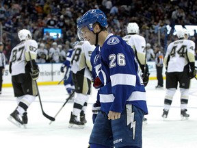 Tampa Bay Lightning right winger Martin St. Louis reacts after Pittsburgh Penguins scored a goal. (Kim Klement/USA TODAY Sports)