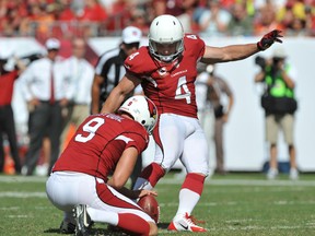 Kicker Jay Feely of the Arizona Cardinals converts an extra point against the Tampa Bay Buccaneers September 29, 2013. (Al Messerschmidt/Getty Images/AFP)