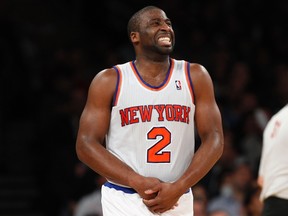 New York Knicks point guard Raymond Felton grimaces during a game against the Milwaukee Bucks in New York in this February 1, 2013 file photo. (REUTERS/Adam Hunger)