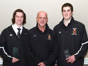 Two members of the Sarnia Legionnaires came home from the annual Western Jr. 'B' awards banquet in London this week with hardware. Here, Ryan Vendramin, right, shows off his award for offensive player of the month while Josh Kestner holds his award as a first team all-star. In the centre is Legionnaires head coach Dan Rose. PHOTO COURTESY OF ANNE TIGWELL