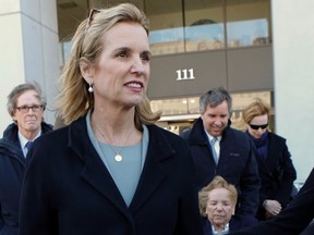 Kerry Kennedy, (2nd left) exits the Westchester County Courthouse in White Plains, N.Y., next to her mother, Ethel Kennedy (bottom), and her brother, Douglas Harriman Kennedy (centre) on February 24, 2014. (REUTERS/Eduardo Munoz)