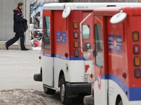 Canada Post delivery trucks. (QMI Agency file)