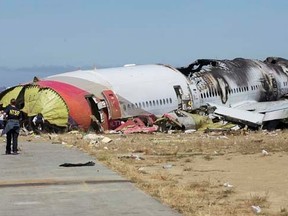 U.S. National Transportation Safety Board (NTSB) photo shows the wreckage of Asiana Airlines Flight 214 that crashed at San Francisco International Airport in San Francisco, California in this handout file photo released on July 7, 2013.   REUTERS/NTSB/Handout via Reuters/Files
