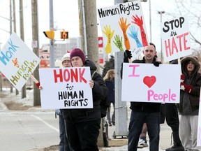 At its peak there were two dozen people holding signs encouraging people to be kind and not judge others for their differences during Tuesday's peace rally in Chatham. Organizer Dave Formosa was pleased with the turn out for the peace rally on Grand Avenue West in front of the Chatham courthouse Tuesday, February 25, 2014. Formosa wanted to draw attention to the need for basic human rights after he heard members of the Lev Tahor had been spat on while out in Chatham, On. (Diana Martin, Chatham Daily News)