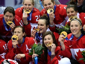 Columnist Ben McLean suggests that the Olympic women's hockey gold-medal game, won by Canada, could be turned into a Disney animated movie. (QMI Agency)
