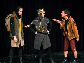 Dennis Galahad, played by Jamie Kim, left, with King Arthur, played by Victoria Byers and Patsy played by Sophia Scott. Central secondary school is producing Spamalot, a musical comedy based on Monty Python and the Holy Grail. Laura Moreland, the director, says the show is the biggest in Central?s history with a cast of 32 students. (MIKE HENSEN, The London Free Press)
