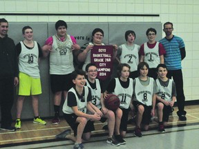 Ecole Arthur Meighen with the championship banner during the Portage la Prairie middle school basketball final, won by EAMS 50-33 Feb. 25. (Kevin Hirschfield/THE GRAPHIC/QMI AGENCY)