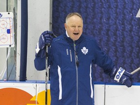 Maple Leafs head coach Randy Carlyle monitors his team's workout at the MasterCard Centre on Feb. 25, 2014. (ERNEST DOROSZUK/Toronto Sun)