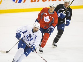 Nazem Kadri leads Leafs teammates Mason Raymond and Dion Phaneuf in a skate Feb. 25, 2014, at the MasterCard Centre. (ERNEST DOROSZUK/Toronto Sun)