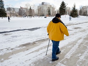 Catherine Badgley, seen here walking in London's Victoria Park Tuesday, endured years of abuse as a child while living at the Southwestern Regional Centre for the developmentally handicapped near Blenheim. A judge has approved $32.7 million in settlements of class-action lawsuits filed on behalf of former residents at the closed Blenheim centre and another in eastern Ontario. (Craig Glover / The London Free Press)