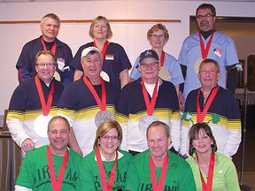 CONTRIBUTED PHOTO
Winners of the Rec League Bonspiel on the weekend included, at the top of the podium, Team Monaco, from left John Howey, Tina VanderWallen-Howey, Marian Muth, Ed Muth. The silver medalist Team Sweden - Brad Legein, Jake Lofthouse, Cam Campbell, and Les Peter. And in the front, bronze medalists Team Ireland - Walt and Diane Kleer, Larry and Tracy Beattie.