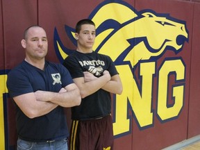 Grade 11 TVRA wrestling MVP Nick Wylie of Banting stands beside his coach Mark Puddicombe.