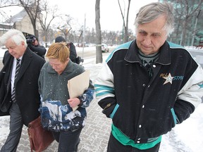 Judy Chernecki (centre) was fined $21,500 while husband Peter Chernecki (right) was sentenced to four months in jail for what officials are calling the worst case of animal hoarding they've ever witnessed. (Brian Donogh/Winnipeg Sun file photo)