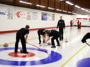 Taylor Schettler's William Morton Warriors rink in action at last weekend's MHSAA curling provincials. (Glen Hallick/QMI AGENCY)