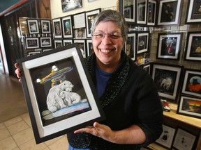 Lesia Anna Bordyniuk is an artist who works with sand. She is photographed in her studio at The Forks (Chris Procaylo/Winnipeg Sun)