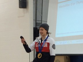 Gold medalist Genevieve Lacasse speaks to students at Mgr. Remy Gaulin Catholic elementary school on Wednesday. Lacasse attended the school and showed off the medal she won as part of the Canadian Olympic women's hockey team.
Supplied photo