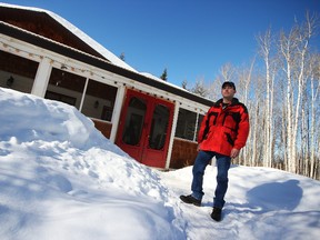 Jason Hemerle stands outside the home of Fred and Ellen McAslund near Grovedale, Alberta on Wednesday, Feb. 26, 2014. Hermerle house sitting for the McAslunds. Yesterday, a seven-month-old baby was left at the side door of the house by two people who had stolen a pickup truck with the baby inside from nearby Grande Prairie, Alberta. Hemerle, who was heading to his job as Zamboni operator at the Grovedale Arena, saw the baby on the doorstep and called RCMP. The baby is in good health and has been returned to it's mother TOM BATEMAN/DAILY HERALD-TRIBUNE/QMI AGENCY