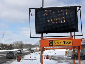 A mobile sign on Princess Street near the CN overpass warns drivers of rough conditions on the road ahead.
Michael Lea The Whig-Standard