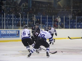 The Sarnia Legionnaires open their first round series of the 2014 GOJHL Playoffs against the London Nationals on Thursday night at the Sarnia Arena. The two teams are pictured above in action on Thursday, Jan. 16. (SHAUN BISSON, The Observer)