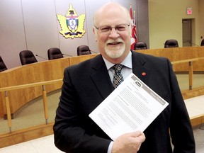Leamington Mayor John Paterson holds the best news he's heard in a long time - Heinz is negotiating with a Canadian company to continue producing products at the 104-year-old company. Photo Taken: Leamington ontario, Thursday Feb. 27, 2014
VICKI GOUGH/ THE CHATHAM DAILY NEWS/ QMI AGENCY
