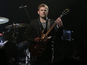 Kings of Leon lead singer Caleb Followill plays Rock City during their Mechanical Bull tour stop at the Air Canada Centre on Tuesday. (JACK BOLAND/Toronto Sun)