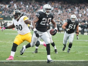 Raiders running back Darren McFadden (20) rushes for a touchdown against the Steelers during NFL action at O.co Coliseum on Oct. 27, 2013. (Ed Szczepanski/USA TODAY Sports/Files)